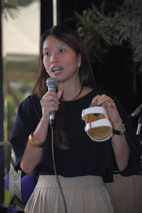 Mariel Veluz of Sewn, showing  sandal with sole made of palay. More on www.sewnsndals.com